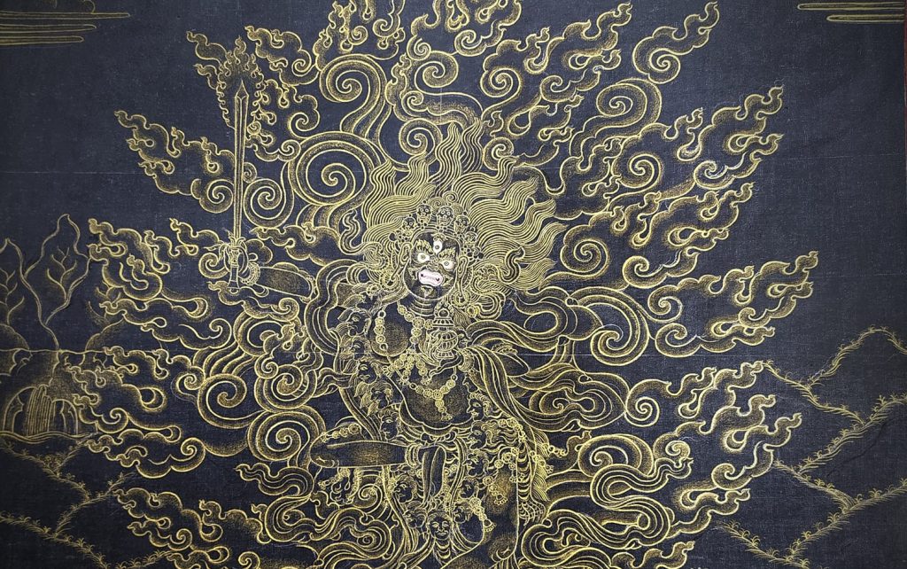 Gold Thangka Paintings of Kaal Bhairav – a sacred Himalayan artwork symbolizing divine power and protection.